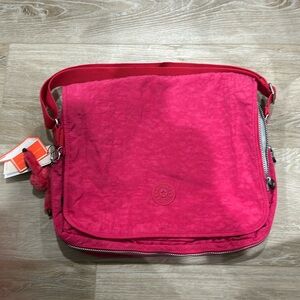 1 Kipling laptop bag upto 15” with many compartments and expandable
